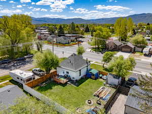 Aerial perspective of suburban area with a mountain backdrop