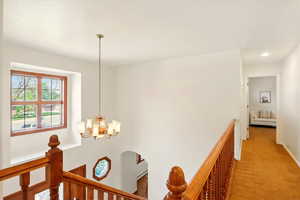 Upstairs hallway open to below