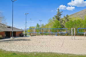 View of property's community featuring volleyball court