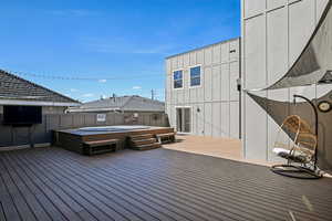 Deck featuring a hot tub