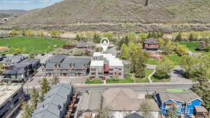 Aerial view of residential area with a mountain backdrop