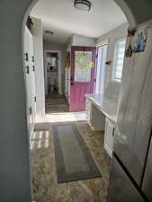 Mudroom with arched walkways