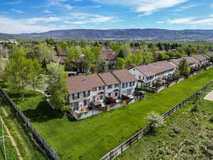 Aerial perspective of suburban area with mountains