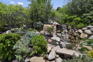 View of yard with water feature