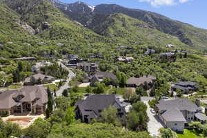 Aerial view of residential area featuring mountains
