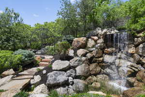 View of yard with water feature