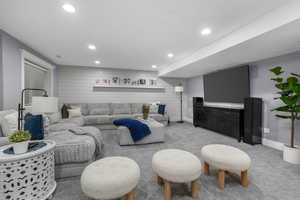 Living room featuring recessed lighting and carpet floors