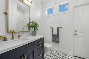 Bathroom with vanity and toilet