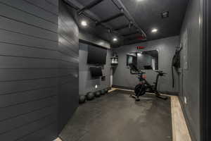 Exercise area featuring baseboards
