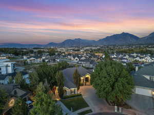 Aerial view of residential area featuring a mountain backdrop