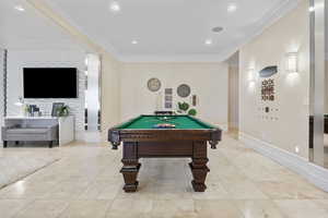 Rec room with ornamental molding, baseboards, billiards table, and recessed lighting