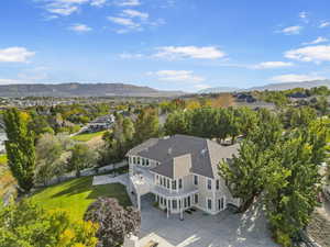 Aerial view of residential area featuring mountains