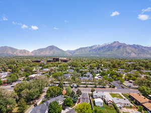 Aerial perspective of suburban area featuring a mountainous background