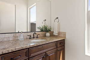Bathroom featuring vanity