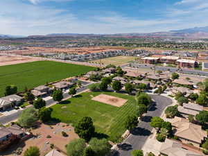 Aerial perspective of suburban area with a mountain backdrop