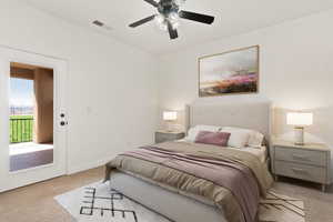 Bedroom with carpet, access to exterior, a ceiling fan, and baseboards