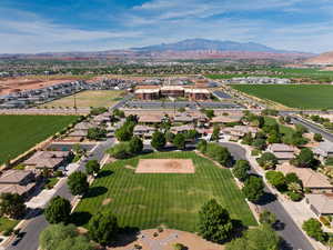 Aerial view of residential area featuring mountains