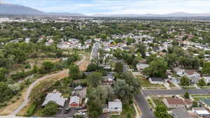 View of property location with a mountainous background and nearby suburban area