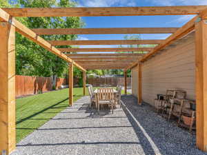 Pergolas and furniture make the backyard perfect for having friends/family over