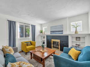 Cuddle up by the fireplace with built-in shelving  - put a TV above the mantle and chill