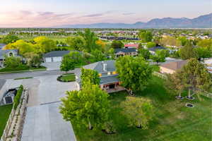 Aerial view of residential of 1-acre lot at sunset