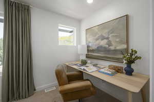 A thoughtfully designed nook tucked into the bedroom, perfect for work or study. *Model