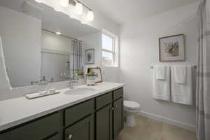 Light-filled and spacious, this bathroom offers a refreshing space to start or end your day.