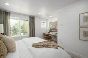 A tranquil bedroom with soft natural light, perfect for rest and relaxation. *Model