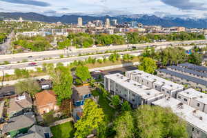 Aerial view of community with a mountain backdrop