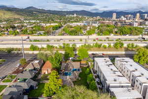Aerial view of community with a mountain backdrop
