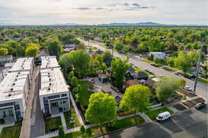 Aerial view of community with a mountain backdrop
