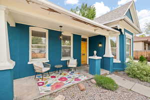 Covered front porch and outdoor seating area