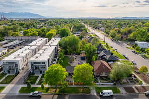 Aerial view of community with a mountain backdrop