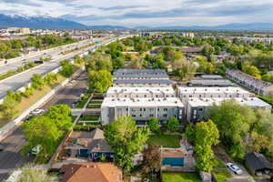 Aerial view of community with a mountain backdrop