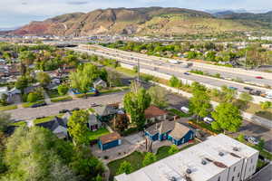Aerial view of community with a mountain backdrop