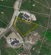 Aerial map of property and surrounding area with property parcel outlined
