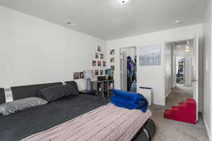 Primary bedroom with large walk in closet