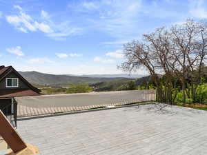 View of patio with a mountain view