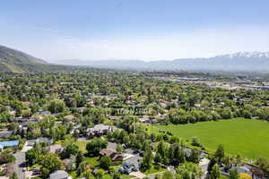 Aerial view of residential area with a mountainous background