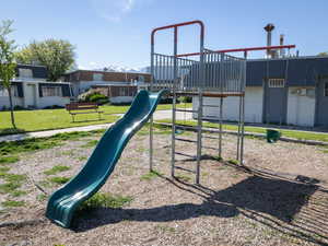 Community playground with a lawn