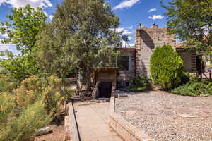 View of front of property with a chimney