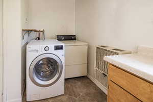 Laundry room featuring washing machine and dryer