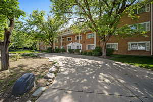 View of front of property featuring brick siding