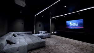 Cinema room with carpet flooring