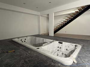 Detailed view of a jacuzzi and recessed lighting
