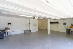 Garage featuring a garage door opener