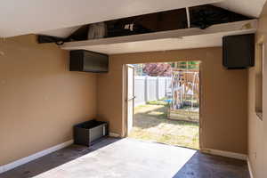 View of patio / terrace featuring fence and stairway