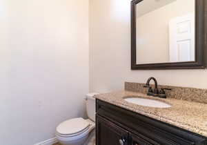 Bathroom with toilet and vanity