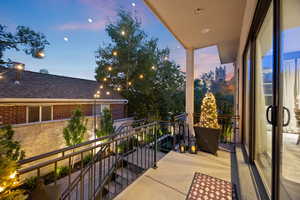 View of balcony at dusk