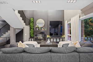 Living area featuring stairway